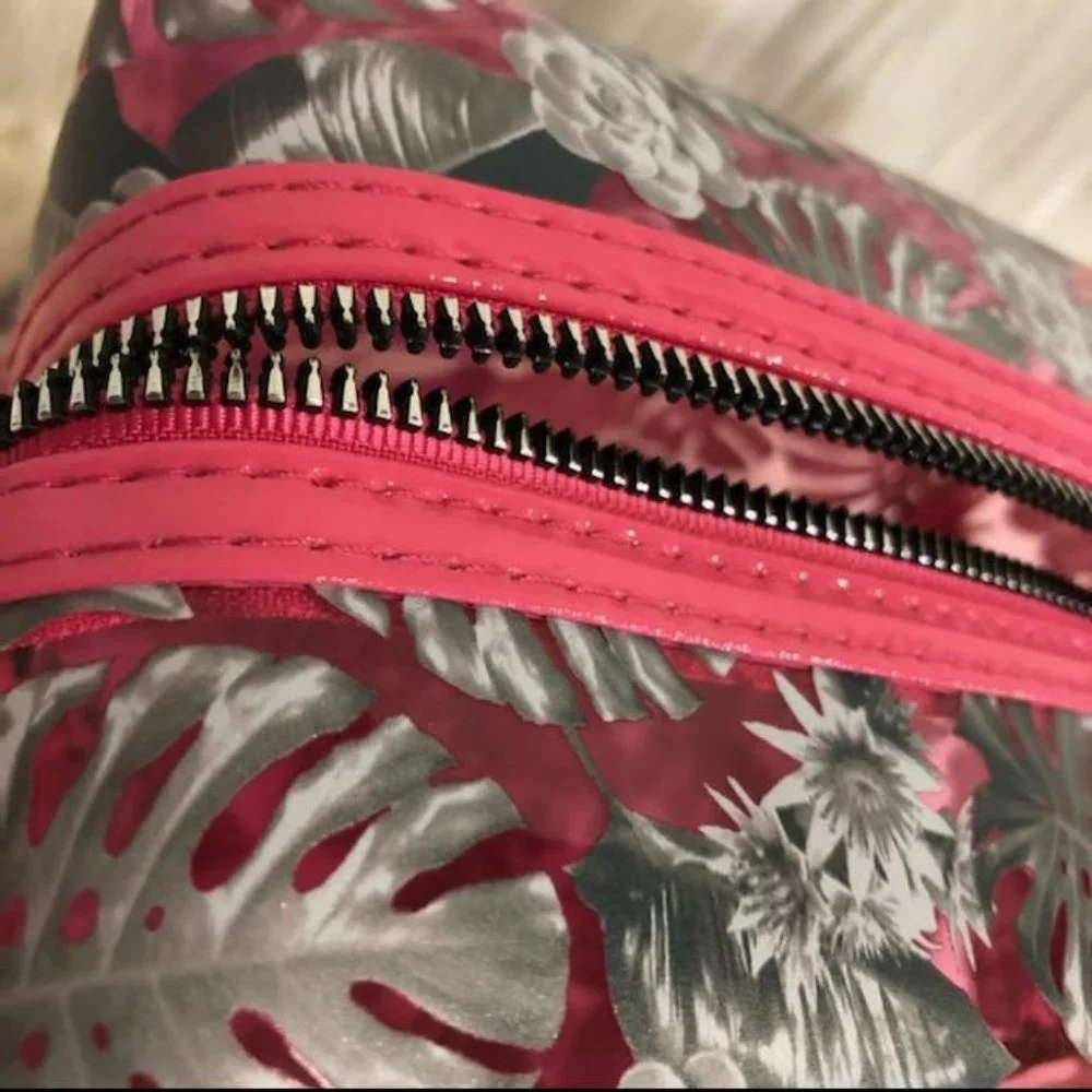 Nicole Miller Pink Plastic Cosmetic Bag
